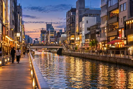 An illustrative view of the Dotonbori canal and city lights