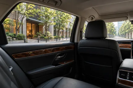 A comfortable rear seat on a drive into a Japanese city